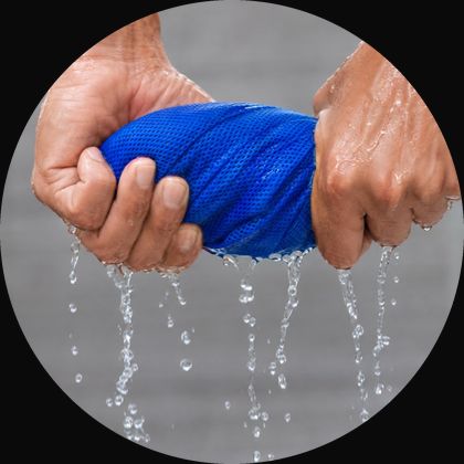 Wringing the water out of a cooling towel
